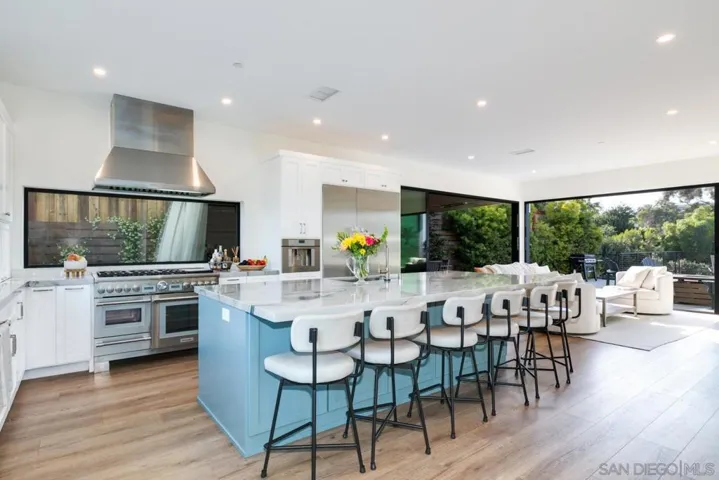 Modern updated kitchen, quartz countertops, huge island & Thermador appliances!