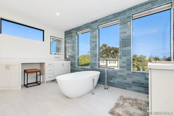Primary Bathroom with soaking tub, rain shower & dual vanities!