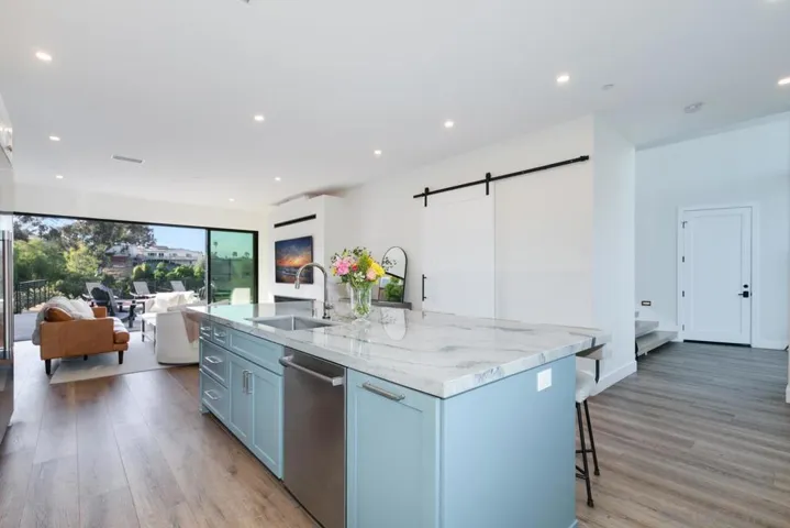 Modern updated kitchen, quartz countertops, huge island & Thermador appliances!