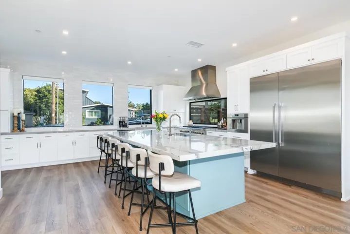 Modern updated kitchen, quartz countertops, huge island & Thermador appliances!