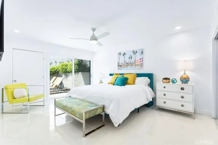 Primary suite with a slider to the private patio area