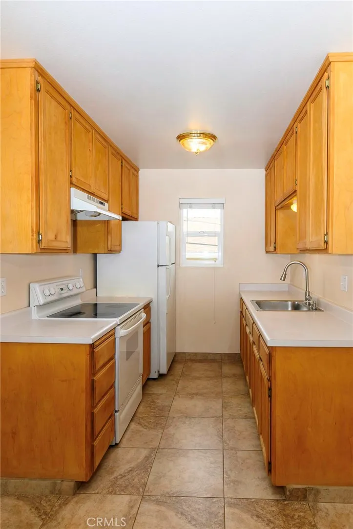 Light & Bright kitchen. Stainless steel sink