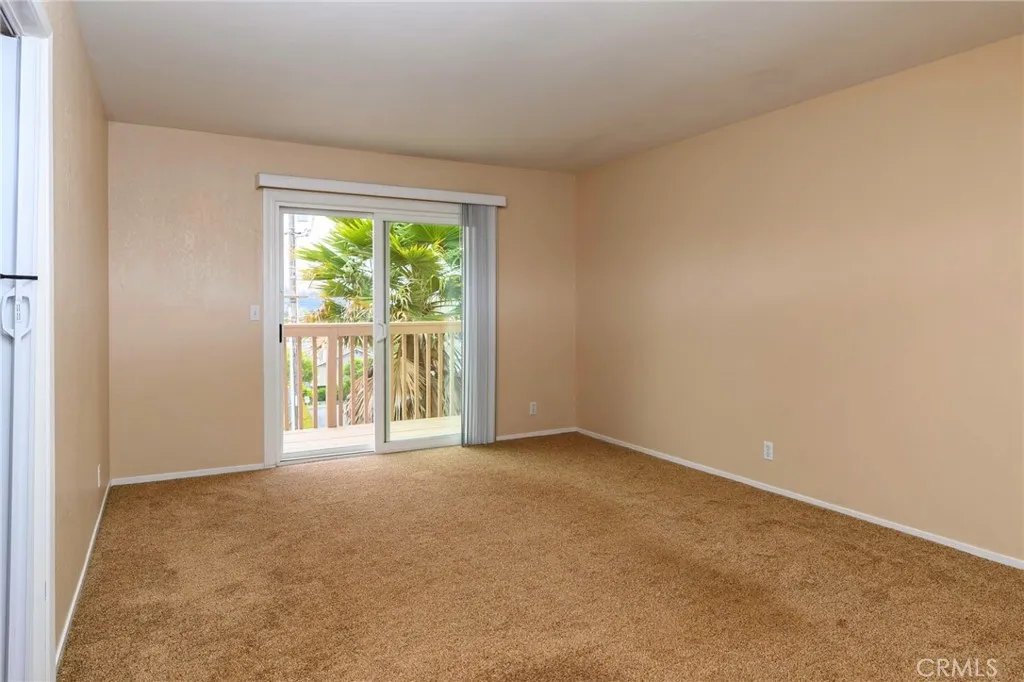 Light and bright living room with door to balcony