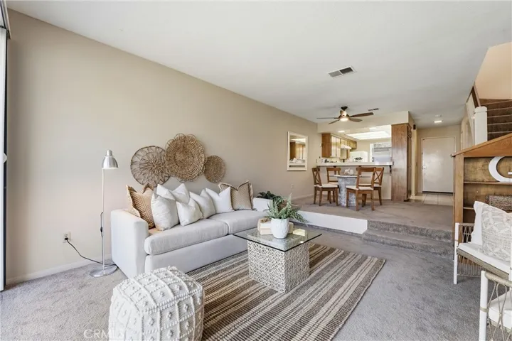 View of the living area from the giant sliding door that opens to the private patio