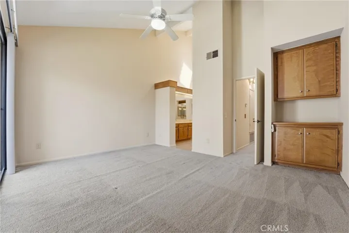 Vaulted ceilings create an airy, expansive feel that elevates the entire space