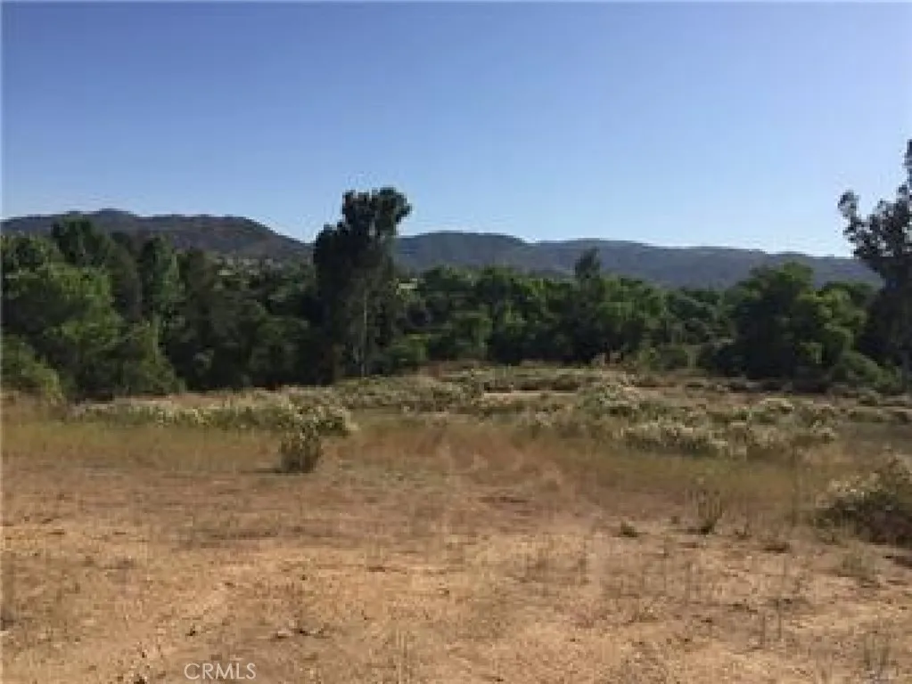 Rolling hills with Murrieta Creek adjacent to the west