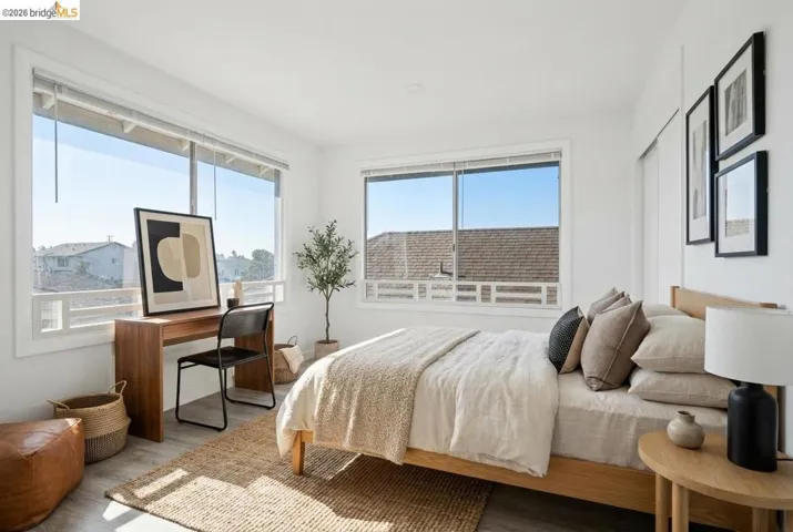 Bedroom with wood finished floors