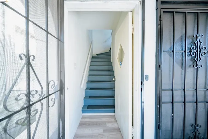 Staircase with wood finished floors