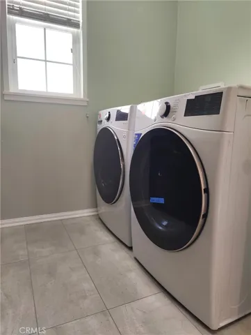 Laundry room with laundry machine for buyer