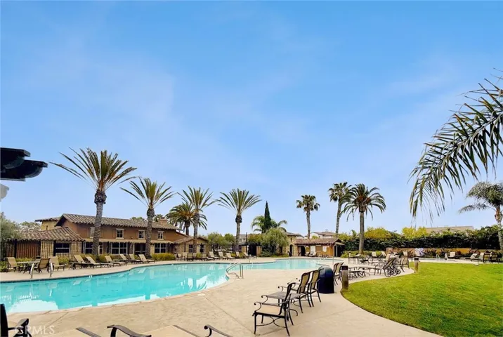 Freeform pool with chaise lounges