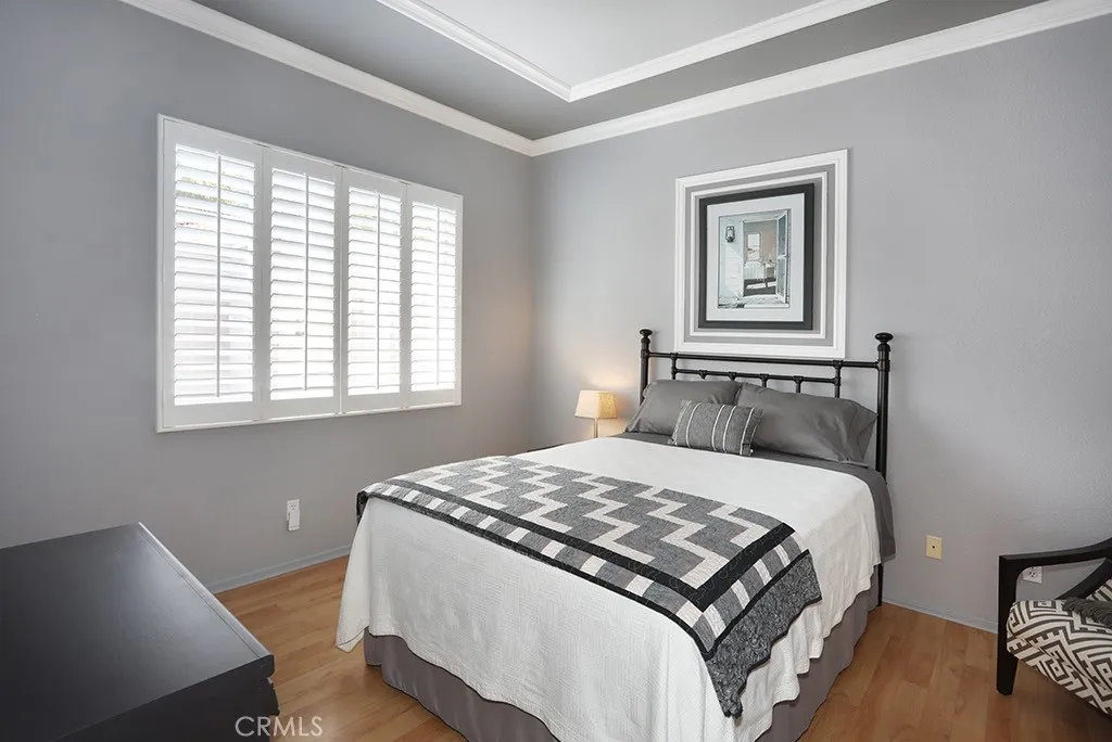 The primary bedroom with high ceilings, custom designer touches.