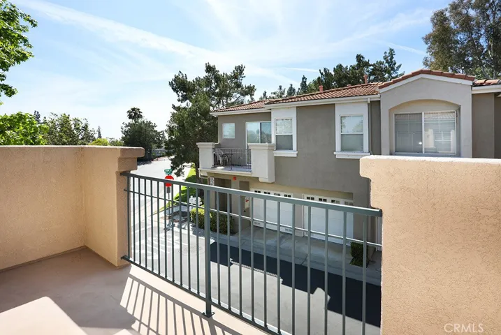 Conveniently located in the gated Altura community. Balcony view from the main level of this two bed, two bath, end unit.