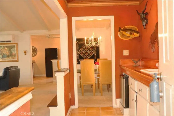 Entry to home, bar on right