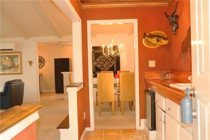 Entry to home, bar on right