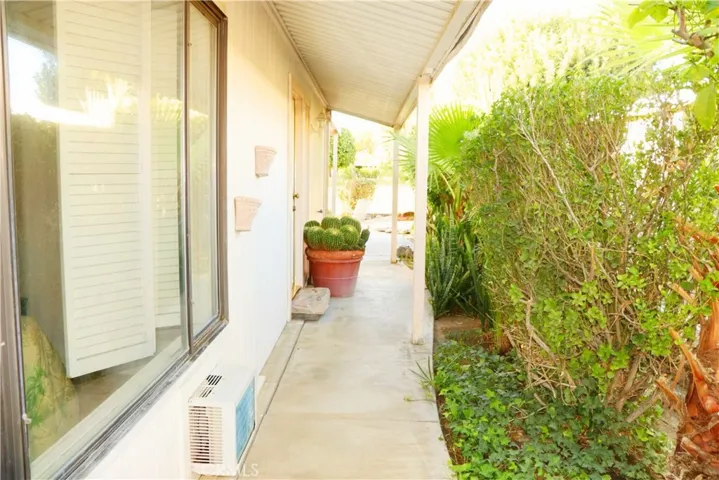 Right side patio of home to side door.