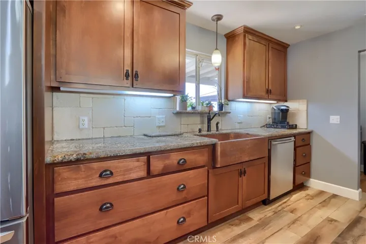 Copper Farmstyle Sink & Custom Cabinets.