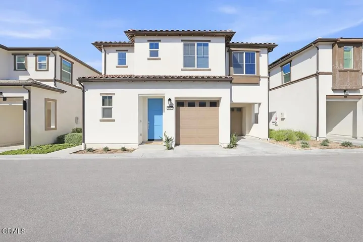 Brightbluedoorinasunnyneighborhood