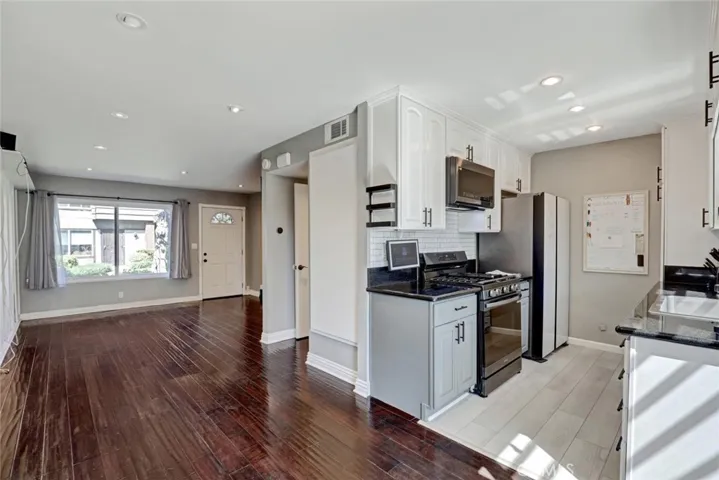 Dining Area toward Kitchen and Living Room
