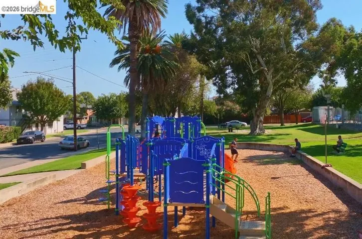 Community play area with a lawn