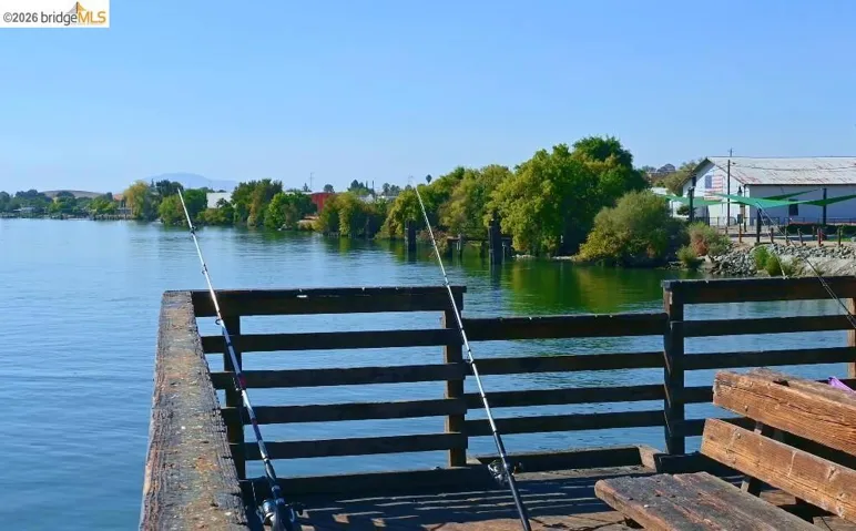 Dock featuring a water view