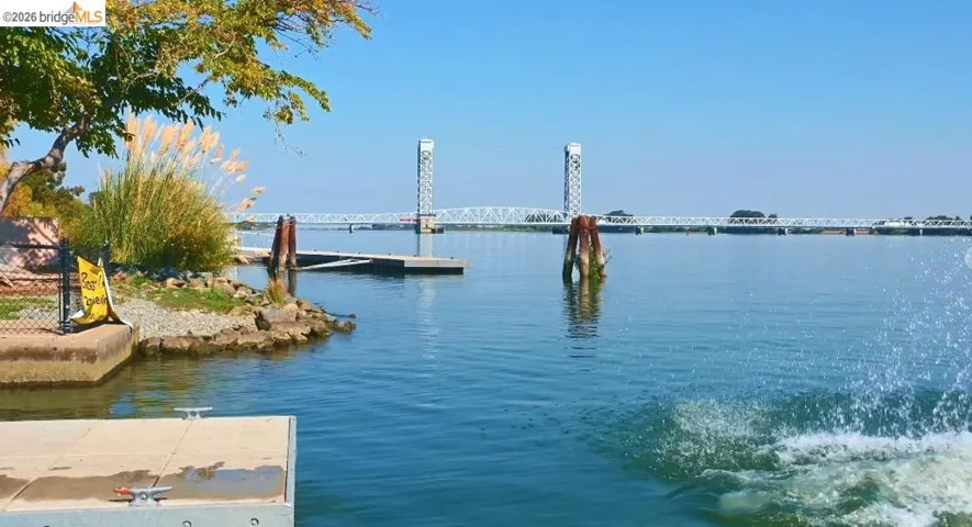 Dock featuring a water view