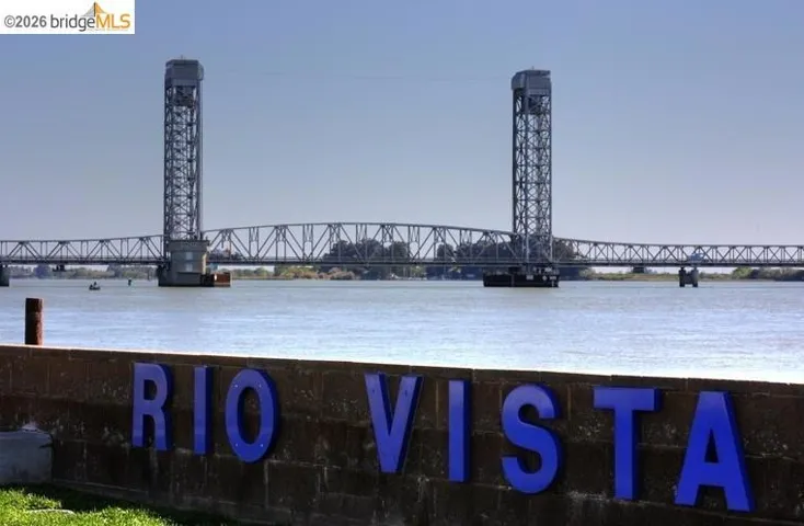 Water view with a notable bridge