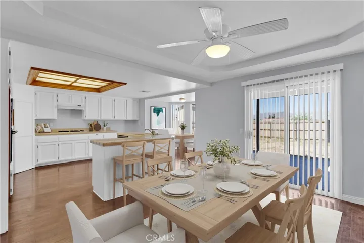 Virtually staged dining room/ kitchen