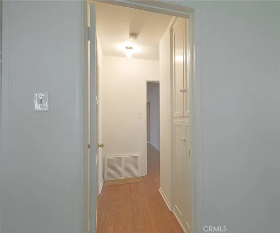 Hallway to two of the  bedrooms