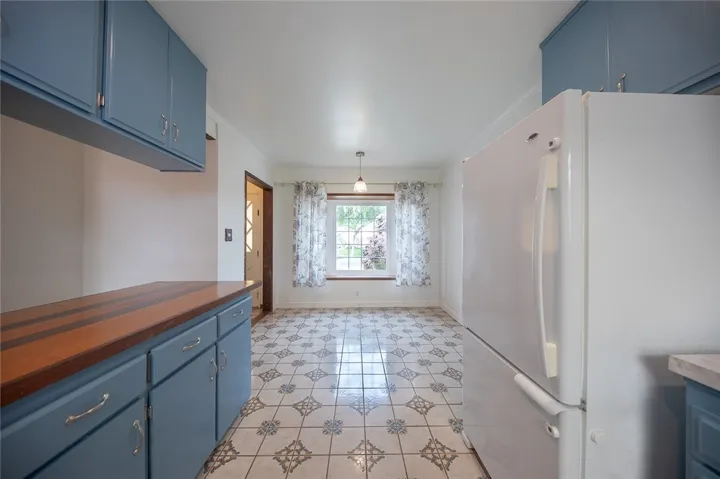 Kitchen looking toward eat in area with bench