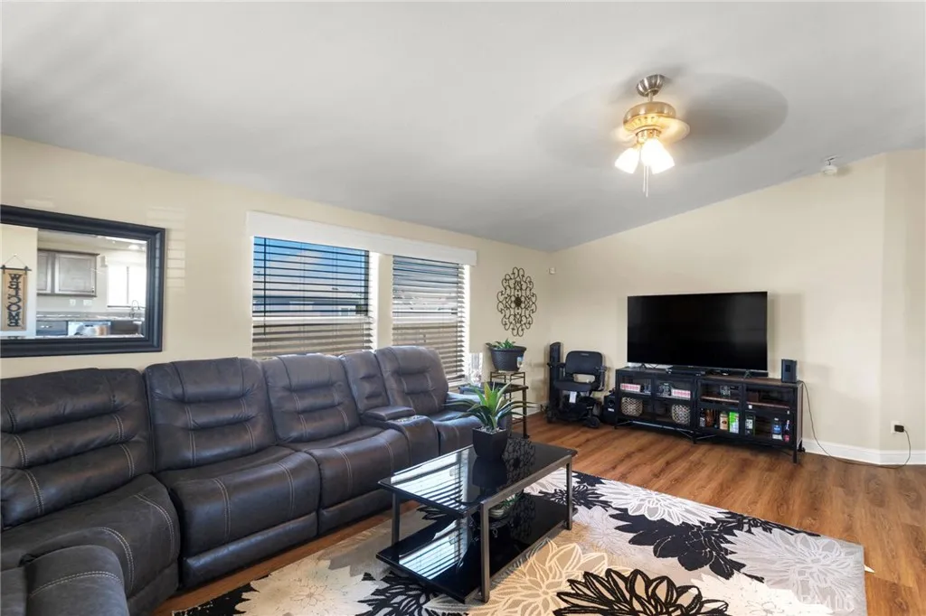 Spacious living room with large sectional and natural light