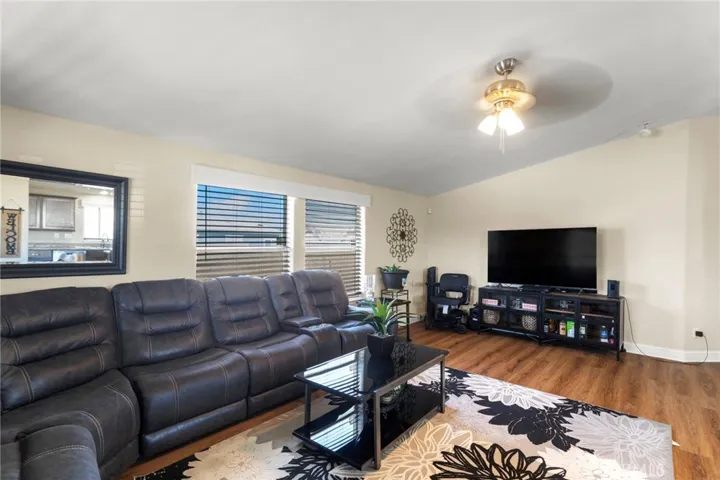 Spacious living room with large sectional and natural light