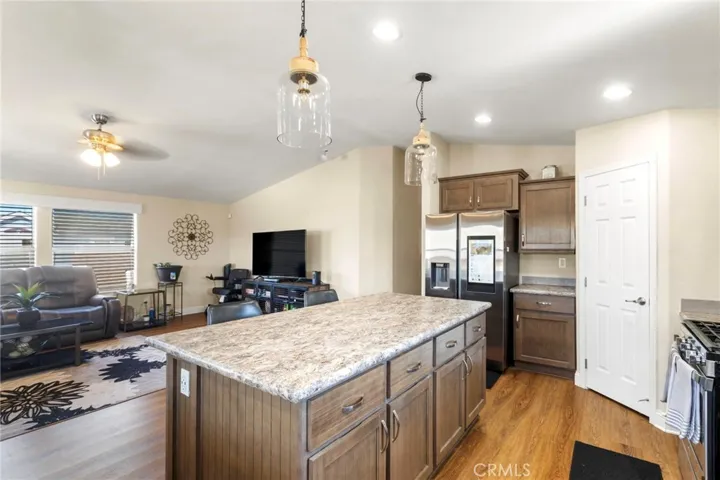 Open concept kitchen, dining, and living area