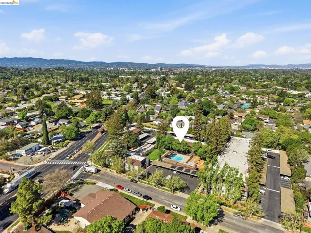 Aerial view of residential area with a mountain backdrop