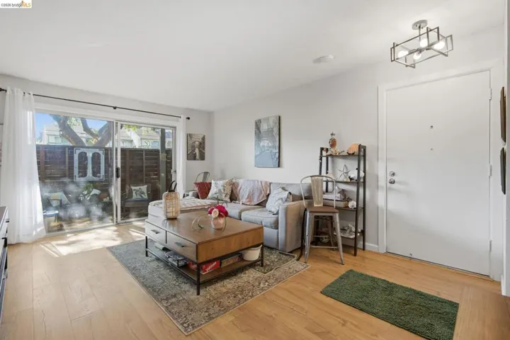 Living room featuring light wood-style flooring