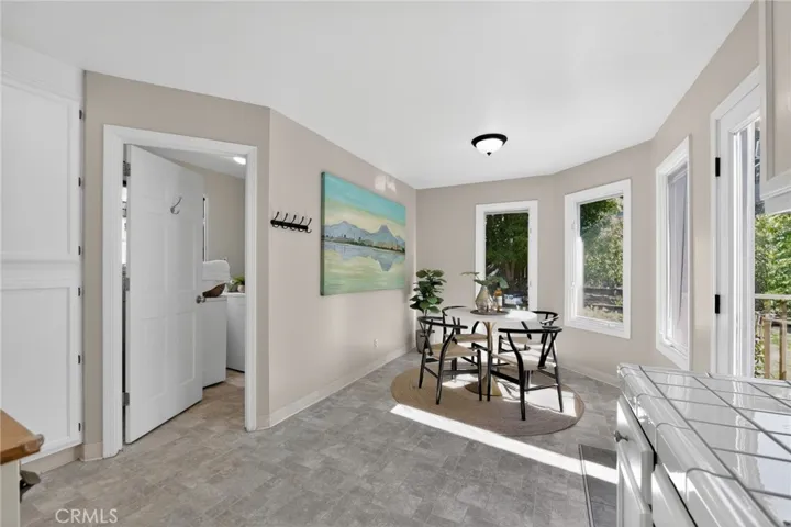 laundry room with 1/2 bath off kithchen