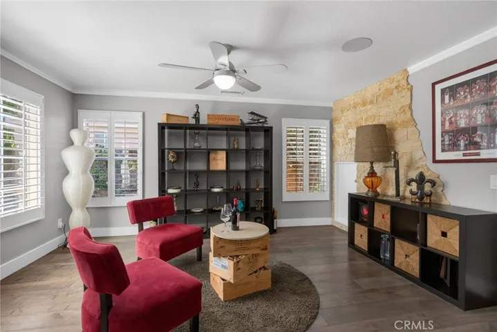 Upon entry - living room to the left-  Jerusalem limestone bricks around the wine cellar door. Surround sound speaker