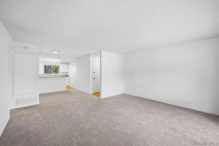 Spacious living room & open floor plan to kitchen