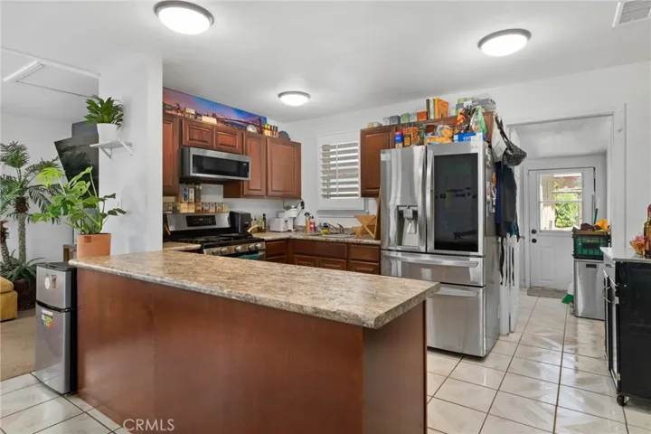 Shows old tile flooring.