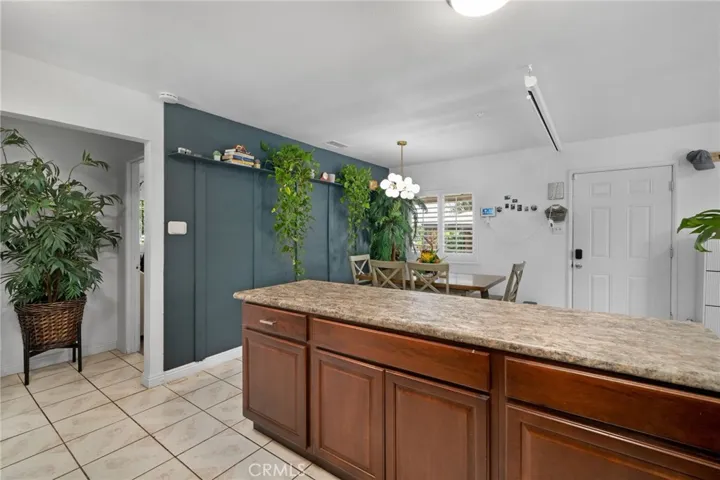 Shows old tile flooring.