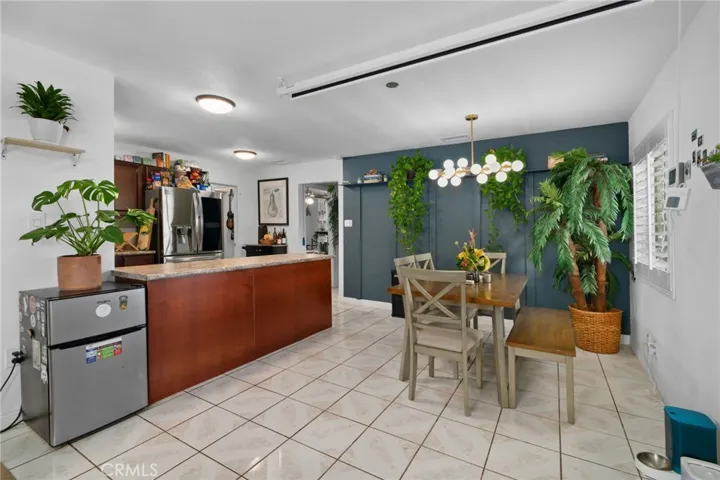 Shows old tile flooring.