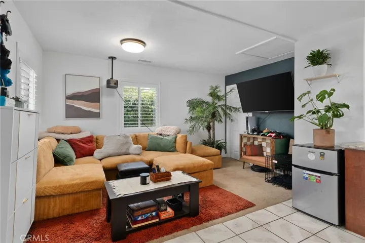 Shows old tile flooring.