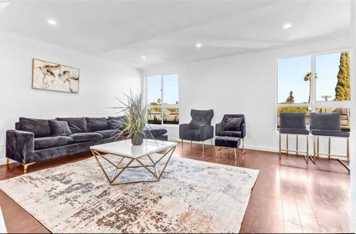 Expansive views make the living room feel open, airy, and inviting.