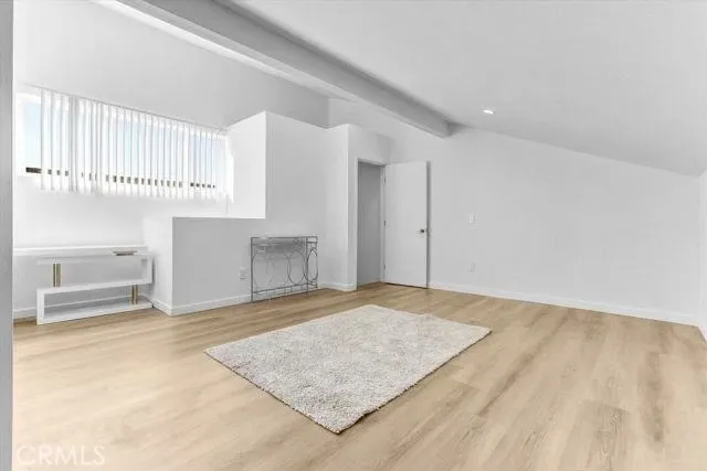 Bedroom 3 offers generous space, highlighted by a beautiful bay window and a walk-in closet.