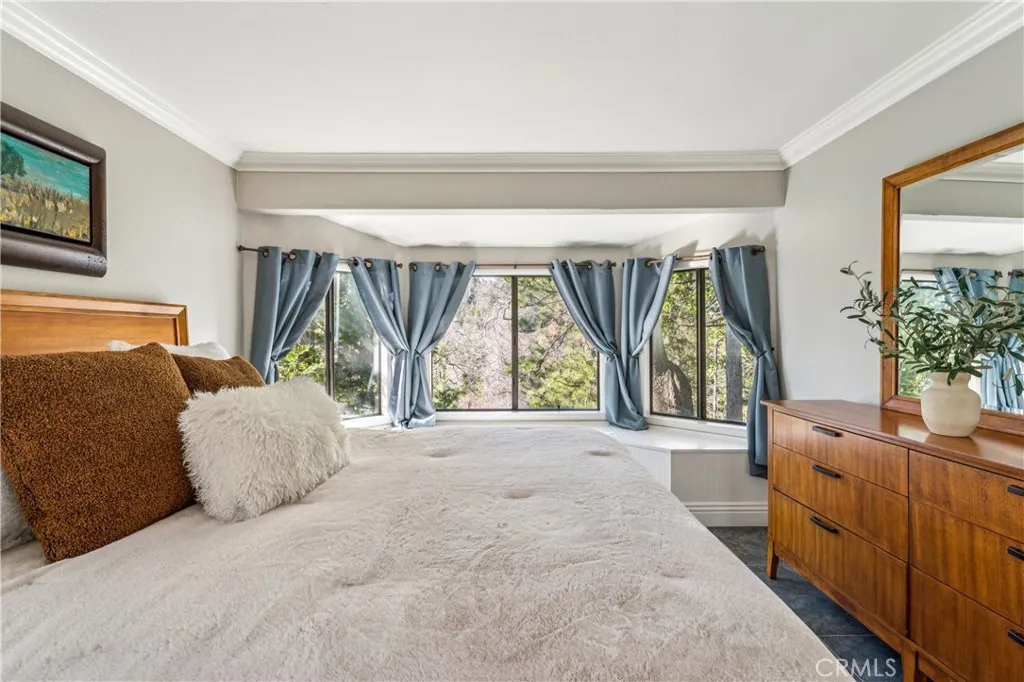 Master Bedroom with Awesome Window Seats to Enjoy the Views!
