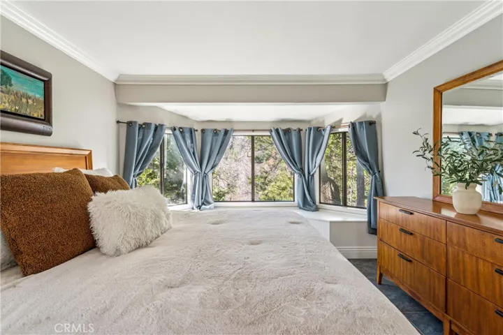 Master Bedroom with Awesome Window Seats to Enjoy the Views!