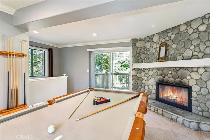 Stairs Lead Down to Sitting Area, 3 Bedrooms and 2 Baths...
