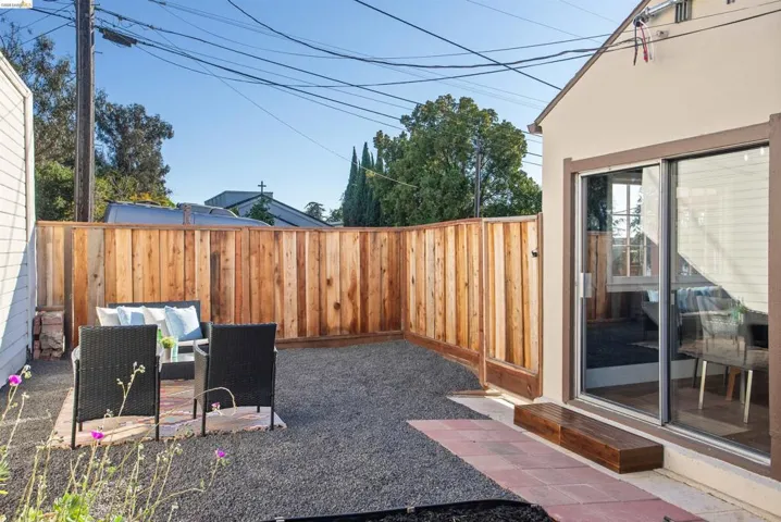 Fenced backyard with a patio area and outdoor lounge area