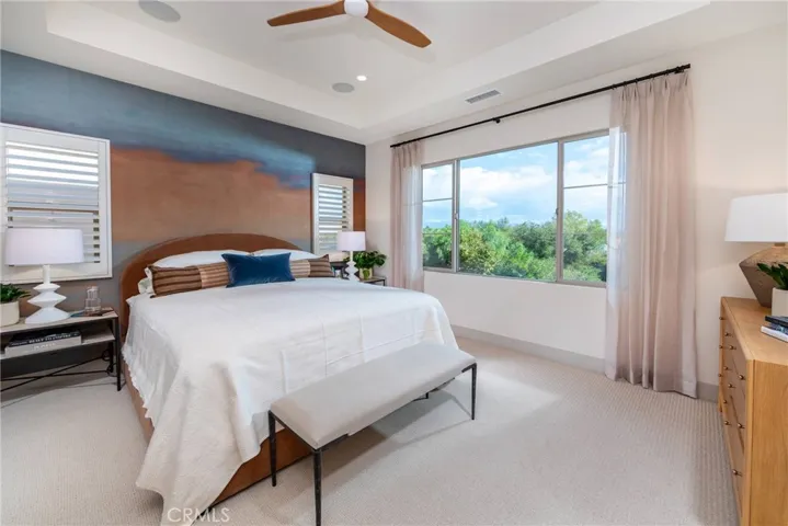 Primary bedroom with coffered ceilings