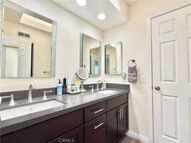 Bathroom opens to hall and to one bedroom