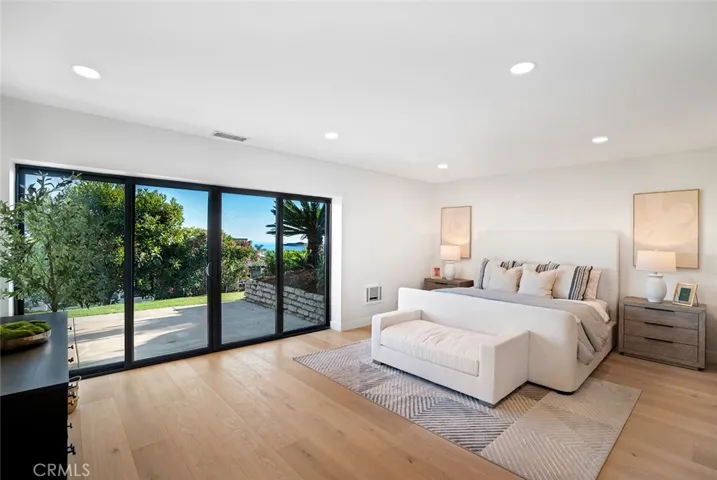 Secondary Bedroom opens to backyard with office